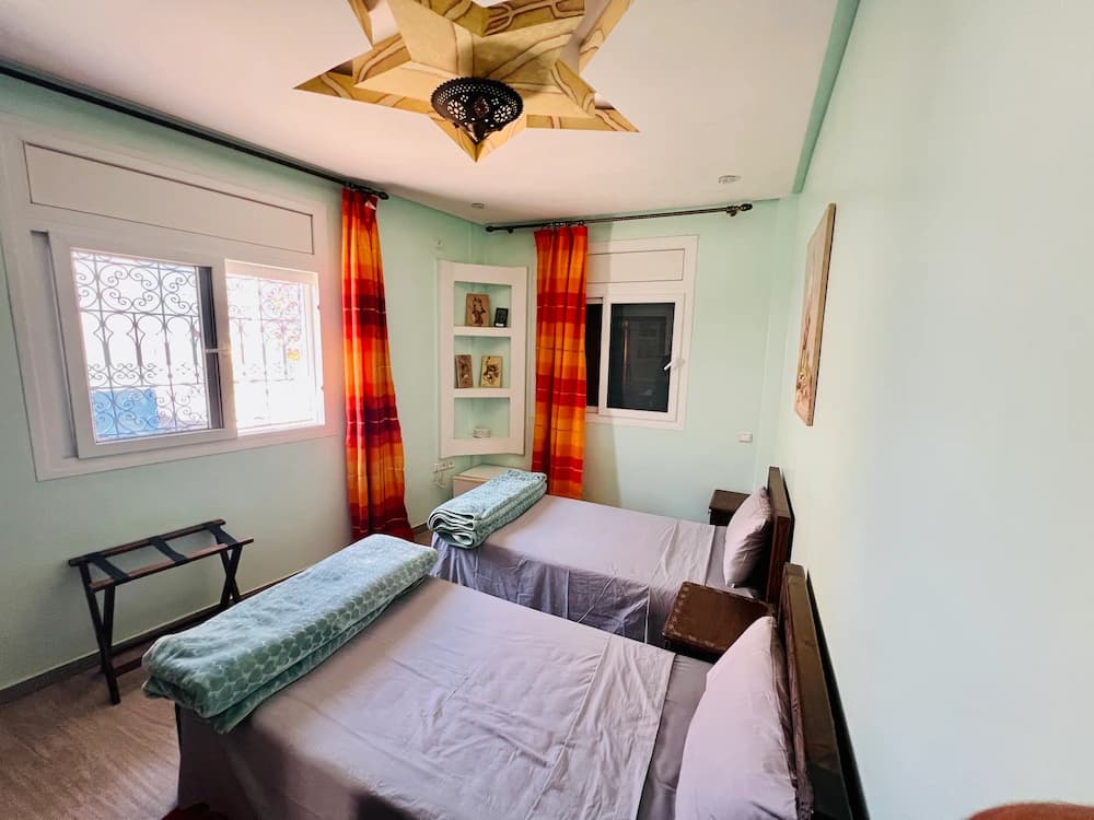 Twin room at the surf house